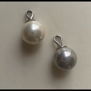 Two “pearl” pendants